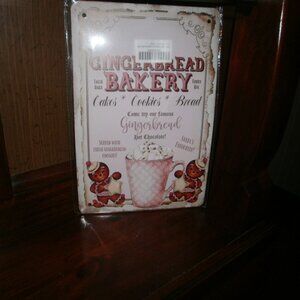 Metal wreath sign Gingerbread Bakery pink and brown 8" X 12" new in wrapper